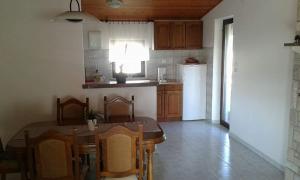 Kuchyň nebo kuchyňský kout v ubytování Apartment Tijano
