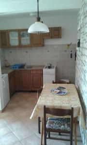 Kuchyň nebo kuchyňský kout v ubytování Apartment Tijano
