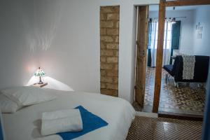 A bed or beds in a room at Casa la nuri