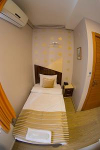 Postel nebo postele na pokoji v ubytování Ottoman Time Hotel
