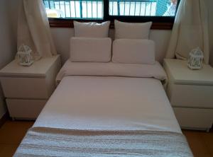 Un pat sau paturi într-o cameră la La Gaviota II