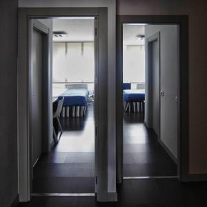 Postel nebo postele na pokoji v ubytování Hostal Averroes