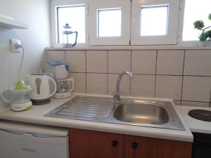 Kuchyňa alebo kuchynka v ubytovaní Castle & Sea View Apt