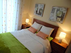 A bed or beds in a room at Playa de Altar Barreiros