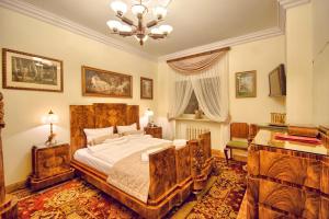 Postel nebo postele na pokoji v ubytování Pałac Tłokinia + 37 fotografií