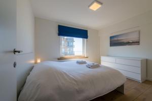 Postel nebo postele na pokoji v ubytování Seaview Zeebrugge