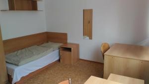 Voodi või voodid majutusasutuse Hostel Strahov toas