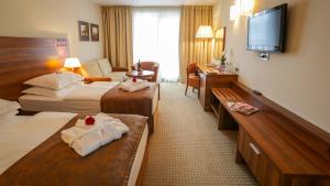 Postel nebo postele na pokoji v ubytování Hotel Trakošćan