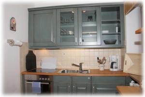 Kuchyň nebo kuchyňský kout v ubytování Ferienapartment Haus Raith