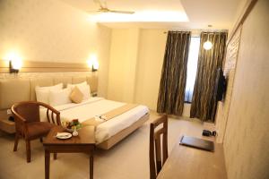 Fotografie z fotogalerie ubytování Hotel Kanha’s Palm Springs v destinaci Bhópál