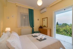 A bed or beds in a room at Villa Status
