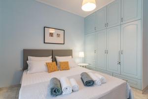 A bed or beds in a room at Villa Status