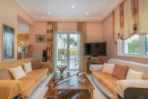 A television and/or entertainment centre at Villa Status