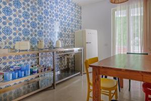 Kuchyň nebo kuchyňský kout v ubytování Doneduà B&B + 17 fotografií