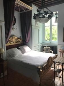 Posteľ alebo postele v izbe v ubytovaní Château de Varennes