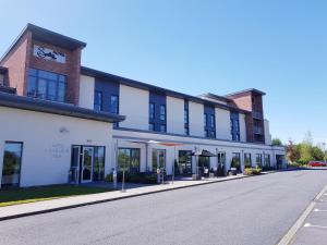 an empty street in front of a building at Smiths At Gretna Green Hotel in Gretna Green