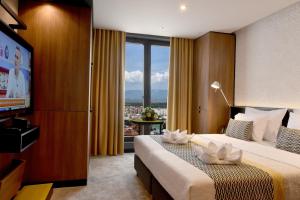 Katil atau katil-katil dalam bilik di Hotel Panoramika Design & Spa