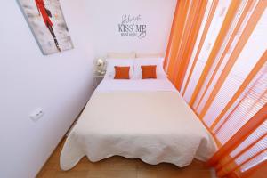Postel nebo postele na pokoji v ubytování Luxury Apartman Rita, Center