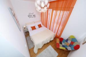 Postel nebo postele na pokoji v ubytování Luxury Apartman Rita, Center