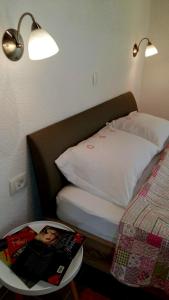 Postel nebo postele na pokoji v ubytování Apartments Nino