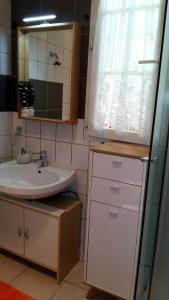 Koupelna v ubytování Apartments Nino