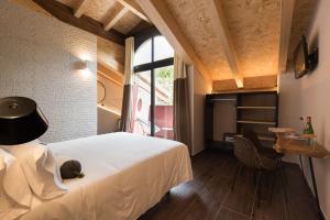 Voodi või voodid majutusasutuse Hotel Rural Sagarlore toas
