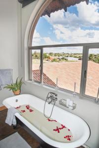 A bathroom at Blue Rain Guest House