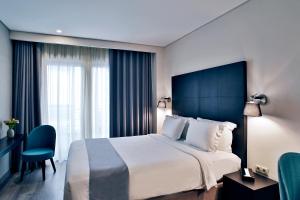 Ένα ή περισσότερα κρεβάτια σε δωμάτιο στο Hotel Lozenge