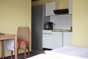 Kuchyň nebo kuchyňský kout v ubytování Haus am Zeiberberg