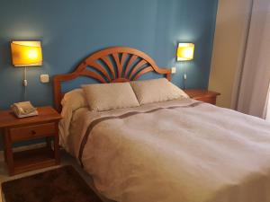 Postel nebo postele na pokoji v ubytování Hotel Laberinto