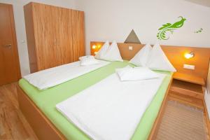 Voodi või voodid majutusasutuse Gasthof Spengerwirt toas