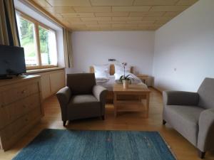 Posezení v ubytování Ferienhaus Bergland