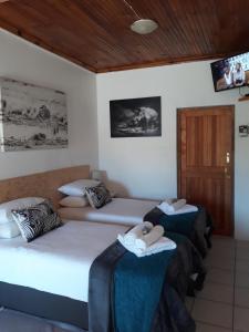 Ένα ή περισσότερα κρεβάτια σε δωμάτιο στο The Bay Inn +112 φωτογραφίες