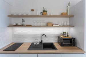 Kuchyňa alebo kuchynka v ubytovaní Apartment Glorijet