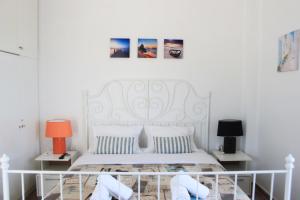 Posteľ alebo postele v izbe v ubytovaní Penthouse & apartments by the Sea airport Airstay