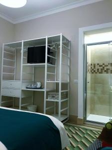 Postel nebo postele na pokoji v ubytování Casa Isabela luxury rooms