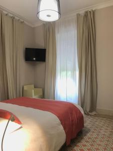 Postel nebo postele na pokoji v ubytování Casa Isabela luxury rooms