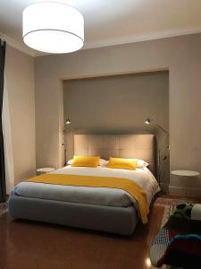 Postel nebo postele na pokoji v ubytování Casa Isabela luxury rooms