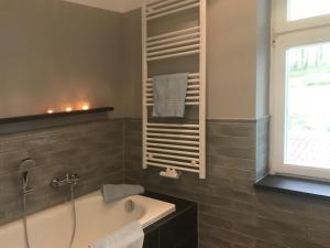 Ein Badezimmer in der Unterkunft Meerblick - Villa Achterkerke