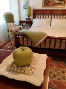 A bed or beds in a room at Locanda Bellavista