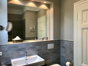 Ein Badezimmer in der Unterkunft Meerblick - Villa Achterkerke
