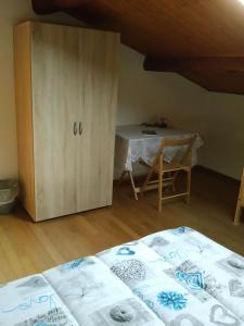 Postel nebo postele na pokoji v ubytování B&B Tisoi
