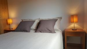 En eller flere senge i et værelse på Quinta Do Acipreste (Antiga Quinta Da Torre)