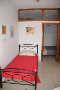 מיטה או מיטות בחדר ב-Ekavi Apartments