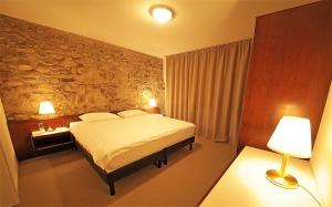 Postel nebo postele na pokoji v ubytování Galion Hôtel & Restaurant