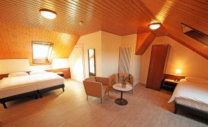 Postel nebo postele na pokoji v ubytování Galion Hôtel & Restaurant
