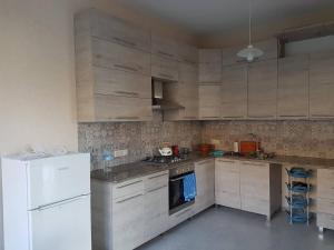 A kitchen or kitchenette at Villa Armazi