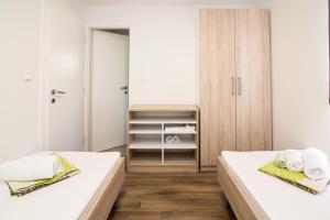 Postel nebo postele na pokoji v ubytování Luxury Mobile Homes Liza