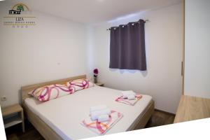 Postel nebo postele na pokoji v ubytování Luxury Mobile Homes Liza