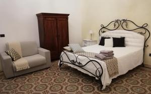 Postel nebo postele na pokoji v ubytování Agorà Suites & Apartments